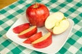 Jonagold apple slices on a white plate Royalty Free Stock Photo