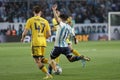 Jonatan Gomez from Racing Club passes the ball during the match between Racing Club vs. Boca Juniors. Royalty Free Stock Photo