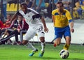 Jonathan De Guzman and Damien Boudjemaa in Petrolul Ploiesti-Swansea FC Royalty Free Stock Photo