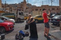 233/5000 Jordan, Amman 19-09-2017. View of a busy street in the center of Amman on a hot day in the summer. Between the busy car t