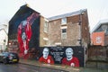 LFC legends Jordan Henderson, Ian St John and Roger Hunt on murals. Royalty Free Stock Photo