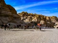 Jordan. Petra. Ancient city in red caves. UNESCO. Horses as transport for excursion. Royalty Free Stock Photo