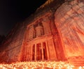 Jordan Petra Monastery with candles burning in front of it at night