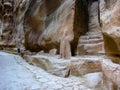 Jordan. Petra. Unfinished cave building in pink mountain city