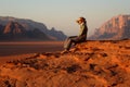 Jordan: Tourist in Wadi Rum Royalty Free Stock Photo