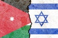 Jordan vs Israel flags on cracked wall, political conflict concept Royalty Free Stock Photo