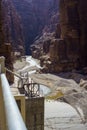 Jordan. Wadi Al Mujib Canyon in Wadi Mujib Nature Biosphere Reserve. Sheer cliffs of enormous height are polished by water