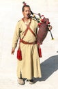 Jordanian man playing bagpipes Royalty Free Stock Photo