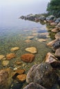 Early morning fog on Jordon Pond, Acadia National Pond, Maine, United States