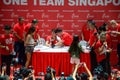 Joseph Schooling, the Singapore's first Olympic gold medalist, signing autographs at Raffles City, as part of his victory par Royalty Free Stock Photo