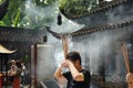 Joss sticks held by worshippers at Candles at Hanshan Temple in Suzhou, China Royalty Free Stock Photo