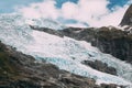 Jostedalsbreen National Park, Norway. Close Up View Of Melting Ice And Snow, Small Waterfall On Boyabreen Glacier In