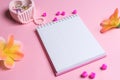 Jotter on a pink background with women`s ornaments. Valentine`s Day Royalty Free Stock Photo