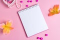 Jotter on a pink background with women`s ornaments. Valentine`s Day Royalty Free Stock Photo