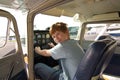 Joung boy in the pilot seat at