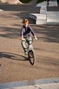 Joung red haired boy jumps with his BMX Bike at the skate park Royalty Free Stock Photo