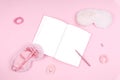 Journal with cute fluffy sleep masks and pink accessories