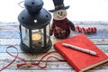 Journal and with snowman and lantern shinny Royalty Free Stock Photo