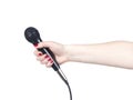 Journalist hand holding microphone on white background Royalty Free Stock Photo