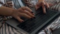 Journalist hands using laptop at remote office closeup. Busy girl type keyboard