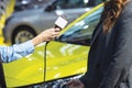 Journalist making media or vox pop interview with unrecognizable female person. Microphone with white copy space. Royalty Free Stock Photo