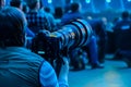 Journalist photographer with a telephoto lens at work