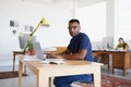 Journalist, portrait or serious black man typing on laptop working on email, business project or online research Royalty Free Stock Photo