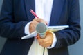 Journalist or reporter at media event, writing fake news, holding microphone Royalty Free Stock Photo