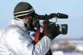 Journalist with a videocamera Royalty Free Stock Photo