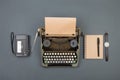 Journalist and writer desktop - typewriter, tape recorder and notepad, top view