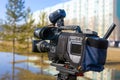 Journalistic television camera on city street. Royalty Free Stock Photo