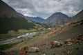 Journey through Altai Mountains, amazing nature of mountain peaks, rivers and streams flow down from slope of mountains. Altai