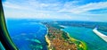 Beautiful view of the island of Bali and Labuan Bajo from the plane window. Royalty Free Stock Photo