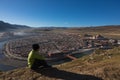 Journey sitting on view point of Yarchen Gar monastery at morning , Ganzi city - China