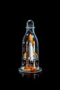 Journey to the Stars: Space Shuttle Embarked on a Cosmic Adventure, Encased in a Bottle Against a Black Background. created with Royalty Free Stock Photo