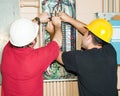 Journeyman Electricians Working Royalty Free Stock Photo