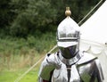 Knight wearing suit of armour read for jousting