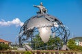 Jovanca Micic seat on top of 3D Globe at the entrance to Jagodina. roundabout