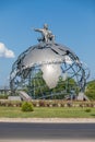 Jovanca Micic seat on top of 3D Globe at the entrance to Jagodina. roundabout