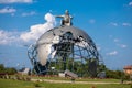 Jovanca Micic seat on top of 3D Globe at the entrance to Jagodina. roundabout