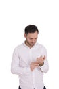Portrait of a handsome young man tying his shirt Royalty Free Stock Photo