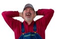 Jovial farmer or worker enjoying a hearty laugh Royalty Free Stock Photo