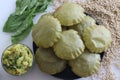 Jowar palak puri or sorghum spinach fried flat bread. Fried bread made of sorghum millet flour and pureed spinach. Served with Royalty Free Stock Photo