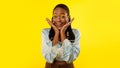 Cheerful Braided Black Woman Posing On Yellow Background, Studio Portrait