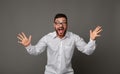 Young excited man in glasses and happy screaming Royalty Free Stock Photo