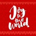 Joy to the world. Christmas greeting card with brush calligraphy. Handwriting on red knitted background