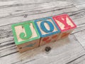 Joy. Joy word from wooden letter blocks Royalty Free Stock Photo