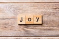 Joy word written on wood block. Joy text on wooden table for your desing, concept Royalty Free Stock Photo