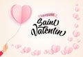 Joyeuse Saint Valentin lettering, hand with paper heart balloon Royalty Free Stock Photo