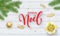 Joyeux Noel French Merry Christmas golden decoration and calligraphy font on white wooden background for greeting card. Vector Chr Royalty Free Stock Photo